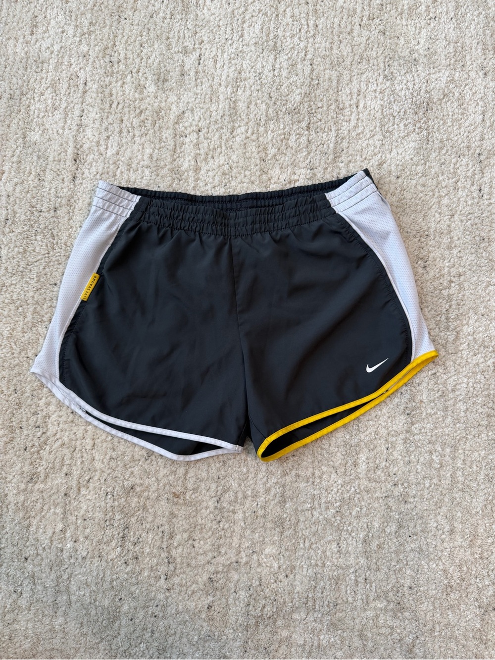 Nike gray Women's Athletic Shorts with White Panels and Yellow Trim